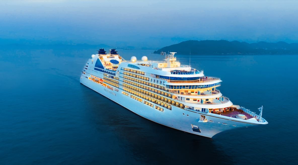 Cruise ship at dusk on calm water